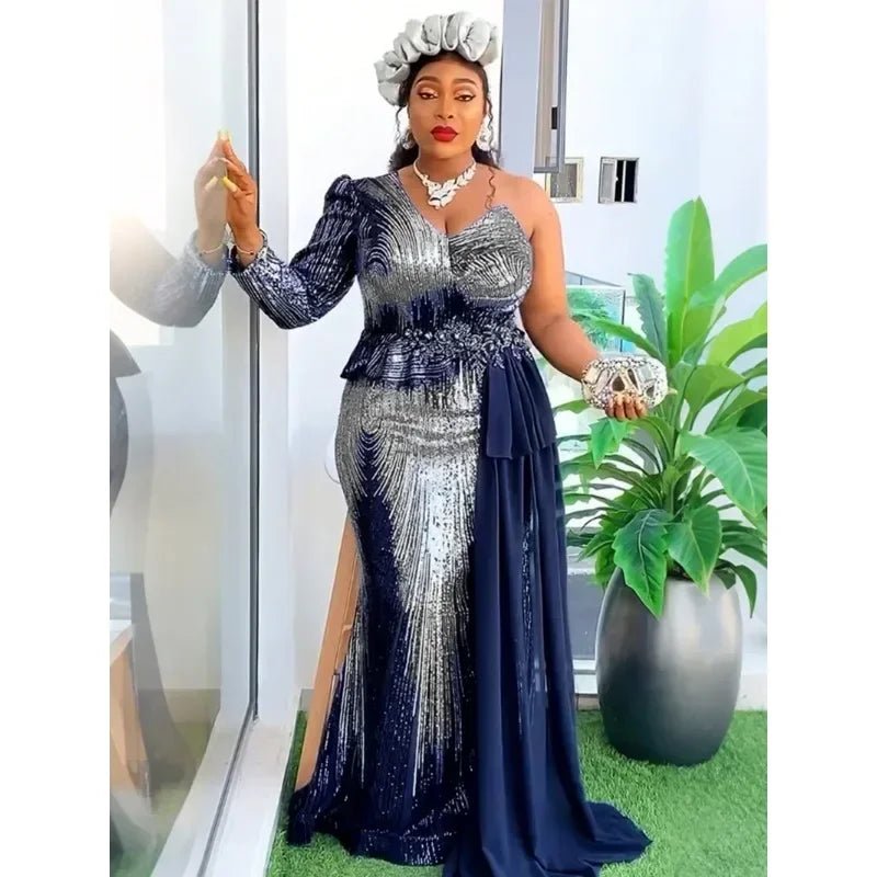Elegant African V-neck maxi dress for wedding party by MANDOTOS INTERNATIONAL, featuring vibrant fabric and stylish design.