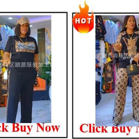 Elegant African V-neck maxi dress by MANDOTOS INTERNATIONAL, stylish long dress perfect for wedding parties.