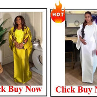 Elegant African V-neck maxi dress by MANDOTOS INTERNATIONAL, suitable for wedding parties, featuring vibrant fabric and flowing design.