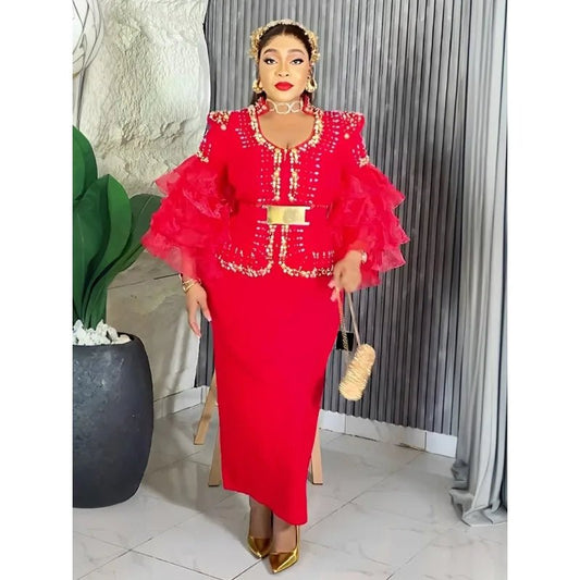 Elegant African V-neck maxi dress by Mandotos International, suitable for wedding parties, featuring vibrant fabric and stylish design.
