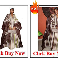 Elegant African V-neck maxi dress by MANDOTOS INTERNATIONAL, featuring intricate patterns and flowing fabric for wedding parties.