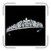 Elegant zircon bridal tiara by MANDOTOS INTERNATIONAL featuring sparkling stones and intricate silver detailing for special occasions.