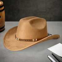 Embellished unisex cowboy hat by MANDOTOS INTERNATIONAL with decorative accents, perfect for stylish outdoor adventures.