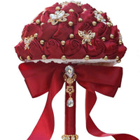 Dark red eternal rose bridal bouquet by MANDOTOS INTERNATIONAL with lush, long-lasting roses for weddings and special occasions.