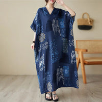 Ethnic Bohemian beach dress for women by MANDOTOS INTERNATIONAL, featuring casual, flowy fabric with vibrant patterns and a relaxed fit.