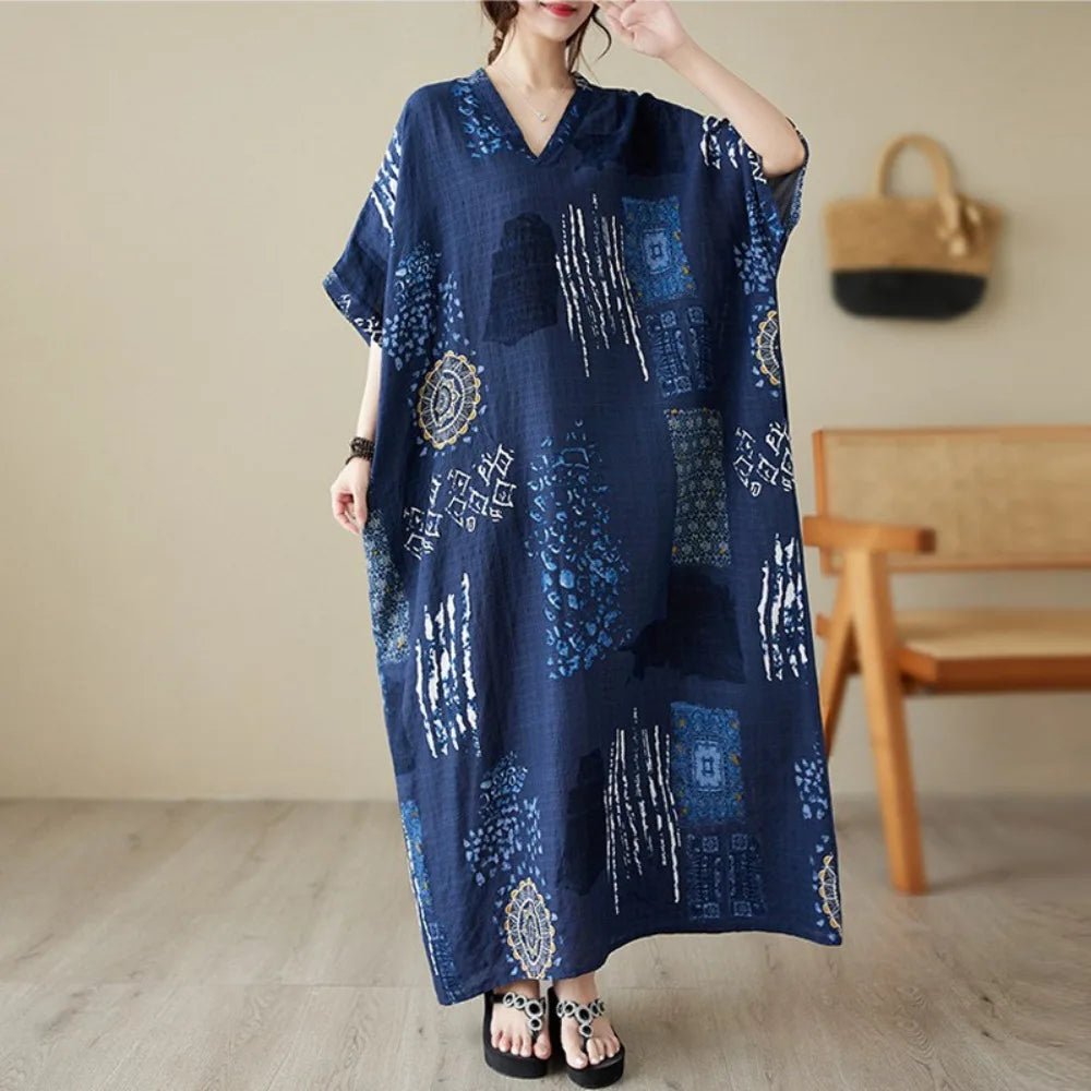 Ethnic Bohemian beach dress for women by MANDOTOS INTERNATIONAL, featuring casual, flowy fabric with vibrant patterns and a relaxed fit.