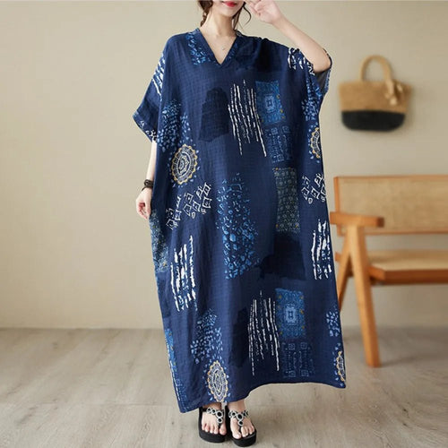 Ethnic Bohemian beach dress for women by MANDOTOS INTERNATIONAL, featuring casual, flowy fabric with vibrant patterns and a relaxed fit.