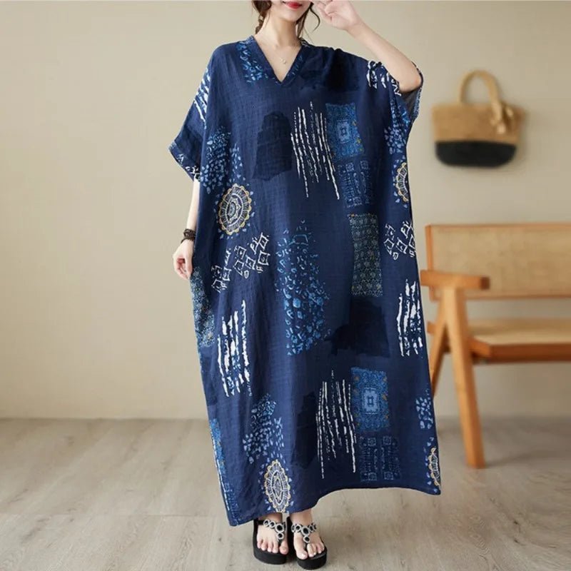 Casual ethnic bohemian beach dress for women by MANDOTOS INTERNATIONAL, featuring flowing fabric and vibrant patterns.