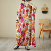 Ethnic Bohemian beach dress for women by MANDOTOS INTERNATIONAL featuring casual, flowy fabric and vibrant boho-inspired design.
