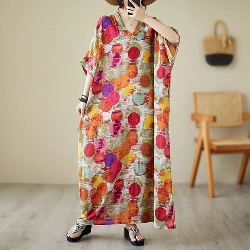 Ethnic Bohemian beach dress for women by MANDOTOS INTERNATIONAL featuring casual, flowy fabric and vibrant boho-inspired design.