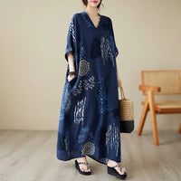 Women’s ethnic bohemian beach dress by MANDOTOS INTERNATIONAL, casual fashion style with vibrant patterns and flowing fabric.