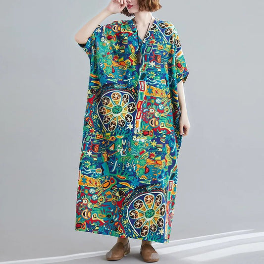 Ethnic Bohemian beach dress for women by MANDOTOS INTERNATIONAL, featuring casual, flowing fabric and vibrant patterns.