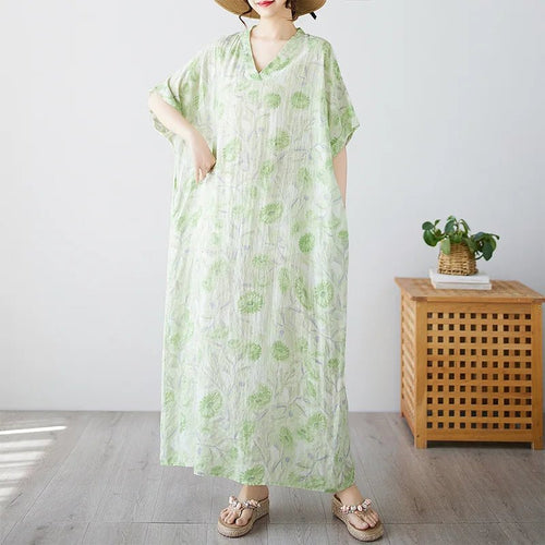 Ethnic bohemian beach dress for women by MANDOTOS INTERNATIONAL, casual fashion with colorful patterns and lightweight fabric.