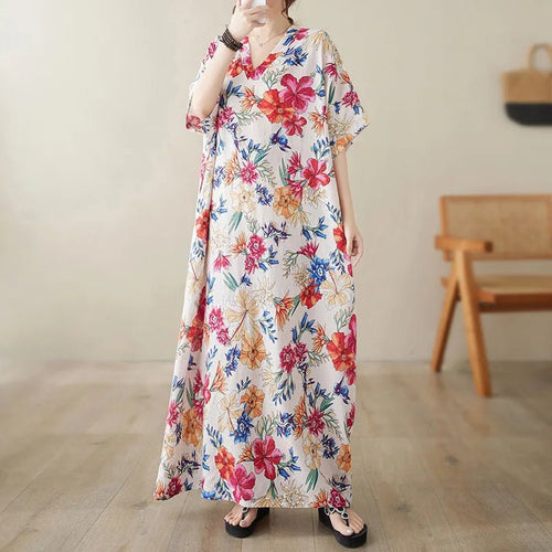 Ethnic Bohemian beach dress for women by MANDOTOS INTERNATIONAL, casual and fashionable with colorful patterns and flowing fabric.