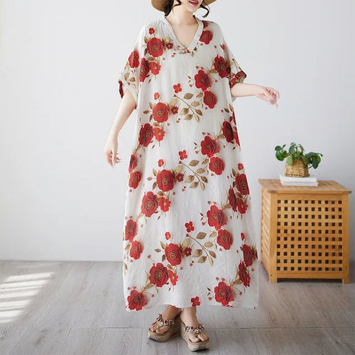 Ethnic Bohemian beach dress for women by MANDOTOS INTERNATIONAL, casual and fashionable with vibrant patterns and flowing fabric.