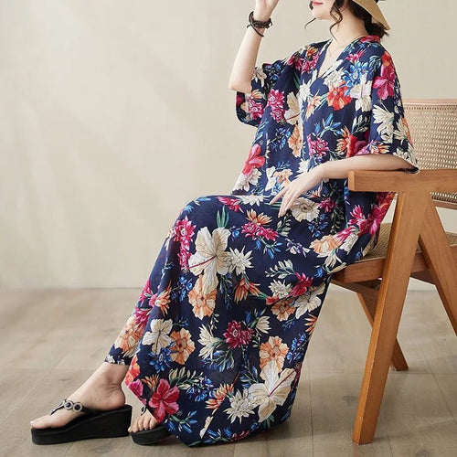 Ethnic Bohemian beach dress for women by MANDOTOS INTERNATIONAL, featuring casual, flowy fabric with vibrant patterns.