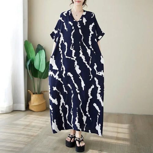Ethnic Bohemian beach dress for women by MANDOTOS INTERNATIONAL, featuring casual, flowy fabric and vibrant ethnic patterns.
