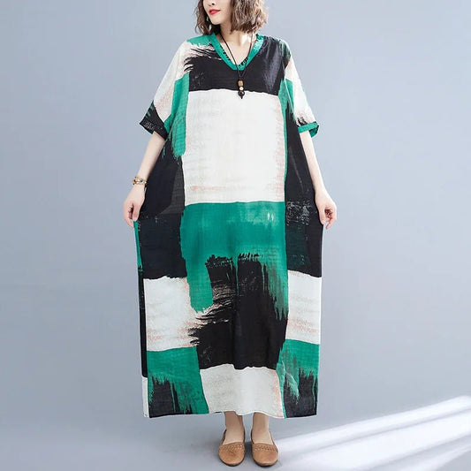 Ethnic bohemian beach dress for women by MANDOTOS INTERNATIONAL, featuring casual, flowy fabric and vibrant ethnic patterns.