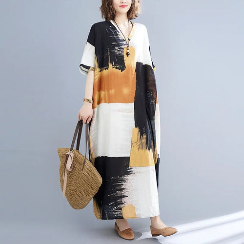 Ethnic Bohemian beach dress for women by MANDOTOS INTERNATIONAL, casual and stylish with colorful patterns and flowing fabric.