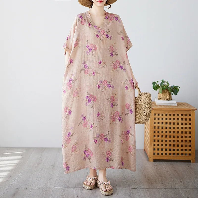 Women’s ethnic bohemian beach dress by MANDOTOS INTERNATIONAL, casual fashion with vibrant print and flowing fabric.