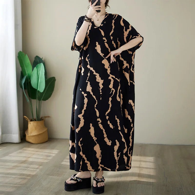 Ethnic Bohemian beach dress for women by MANDOTOS INTERNATIONAL, casual and stylish with vibrant patterns, perfect for summer wear.