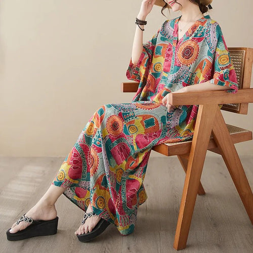 Ethnic Bohemian beach dress for women by MANDOTOS INTERNATIONAL, casual and stylish with colorful patterns and flowing fabric.