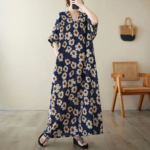 Women’s Ethnic Bohemian Beach Dress by MANDOTOS INTERNATIONAL, casual fashion style with vibrant patterns and flowing fabric.