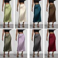 European American style satin midi skirt by MANDOTOS INTERNATIONAL, shown in a sleek, elegant design with a smooth satin finish.