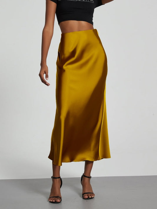 European American style satin midi skirt by MANDOTOS INTERNATIONAL, displayed on a model showcasing its elegant design.