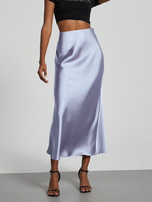 European American style satin midi skirt by MANDOTOS INTERNATIONAL, featuring smooth fabric and a stylish midi length.