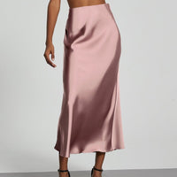 European American style satin midi skirt by MANDOTOS INTERNATIONAL, shown in a soft, flowing fabric with a stylish midi length.