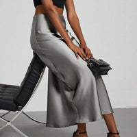 European American style satin midi skirt by Mandotos International, shown in a sleek, elegant design with a smooth satin finish.