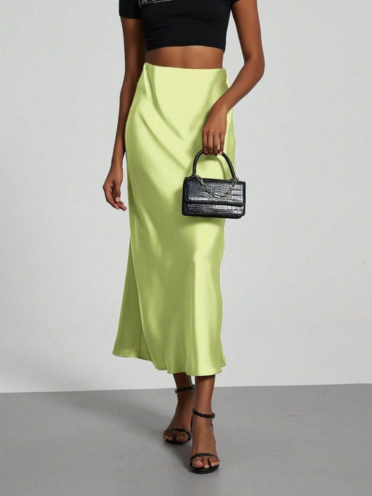 European American style satin midi skirt by MANDOTOS INTERNATIONAL, shown in a stylish mid-length design.