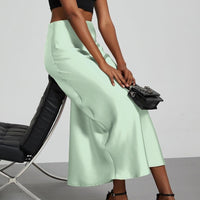 European American style satin midi skirt by Mandotos International, shown in a sleek, elegant design suitable for various outfits.