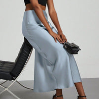 European American style satin midi skirt by Mandotos International, shown in a sleek, flowing design perfect for versatile fashion.