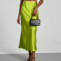European American style satin midi skirt by MANDOTOS INTERNATIONAL, showcasing a sleek, elegant design in a smooth satin fabric.