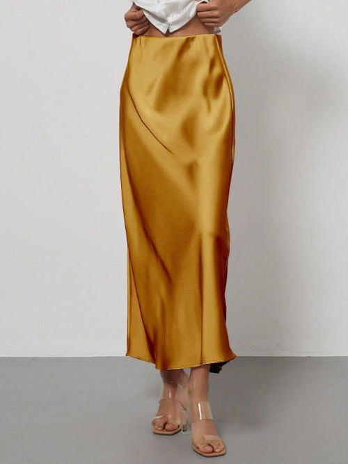 European American style satin midi skirt by MANDOTOS INTERNATIONAL, shown in a sleek, flowing design perfect for elegant fashion.