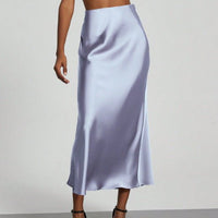 European American style satin midi skirt by MANDOTOS INTERNATIONAL, featuring a smooth, elegant fabric and classic midi length.