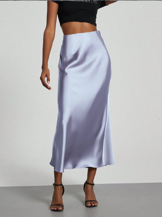 European American style satin midi skirt by MANDOTOS INTERNATIONAL, featuring a smooth, shiny fabric and elegant midi length.