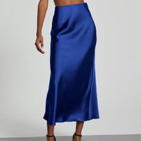 European American style satin midi skirt by Mandotos International, showcasing a sleek, flowy design perfect for stylish wear.