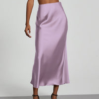European American style satin midi skirt by Mandotos International, in stock, featuring a sleek, elegant design for fashionable wear.