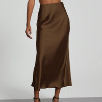 European American style satin midi skirt by MANDOTOS INTERNATIONAL, showcasing a smooth, flowing fabric and elegant design.