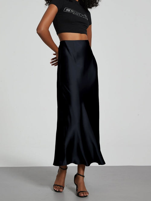 European American style satin midi skirt by MANDOTOS INTERNATIONAL, featuring a smooth fabric and elegant midi length.