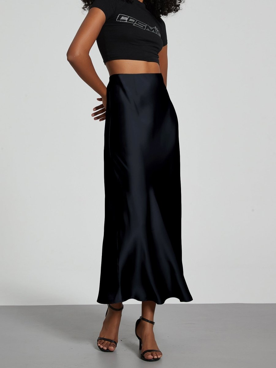 European American style satin midi skirt by MANDOTOS INTERNATIONAL, featuring a smooth fabric and elegant midi length.