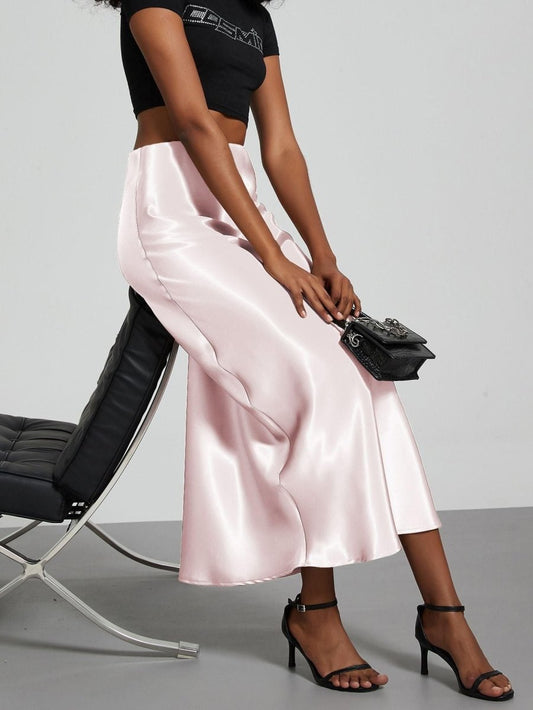 European American style satin midi skirt by Mandotos International, showcased in a retail display with smooth, shiny fabric.