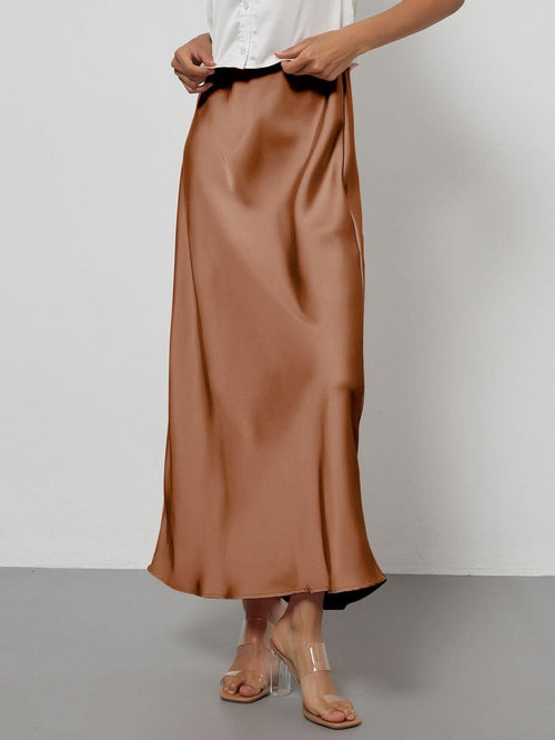 European American style satin midi skirt by MANDOTOS INTERNATIONAL, shown in a stylish, flowing design with a smooth satin finish.