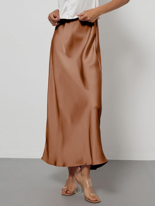 European American style satin midi skirt by MANDOTOS INTERNATIONAL, shown in a stylish, flowing design with a smooth satin finish.