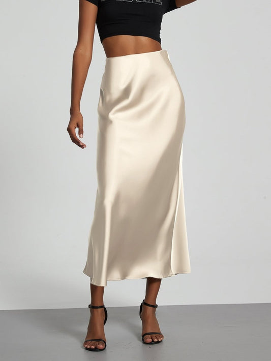 European American style satin midi skirt by MANDOTOS INTERNATIONAL, elegant and smooth fabric, in stock for wholesale purchase.