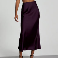 European American style satin midi skirt by Mandotos International, shown in a sleek, flowing design with a smooth satin finish.