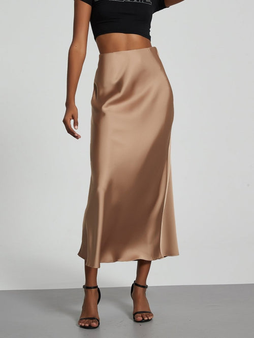 European American style satin midi skirt by MANDOTOS INTERNATIONAL, displayed in a close-up view showing its smooth fabric and elegant design.